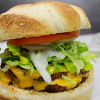 Geno’s Classic Burger ＆ Fries · Lettuce, tomato, onions, pickle, and yellow American cheese.