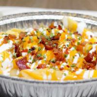 Loaded Fries · Cheddar cheese, bacon, geno’s cheese sauce, sour cream, and chives.