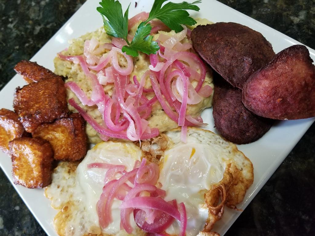 Tres Golpes · (mangu) mashed plantains , Fried Eggs , Salami , Fried White Cheese , sauteed onions.