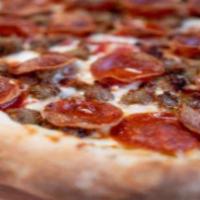 Gourmet Meat Pizza · Greek's Italian sauce, select blended cheeses, Italian sausage, meatballs, baked ham, Indian...