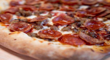 Gourmet Meat Pizza · Greek's Italian sauce, select blended cheeses, Italian sausage, meatballs, baked ham, Indiana bacon & extra sliced pepperoni.