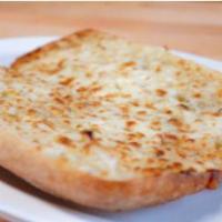 Cheese Bread · Greek's special garlic butter & select blended cheeses.