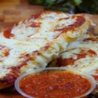 Pepperoni Bread · Greek's special garlic butter, sliced pepperoni & select blended cheeses.