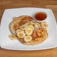 Buttermilk Pancakes · Fresh fruit, maple syrup.