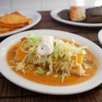 Bean Smothered Burrito · Beans,Rice,Green Chile,Cheese, Lettuce and Sour Cream