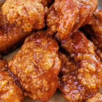 Boneless Chicken Wings  · Boneless breaded chicken wings tossed in your choice of sauce or rub. 