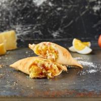 Bacon Egg & Cheese Empanada · Diced crispy bacon bits with mozarella over a fresh omelette.