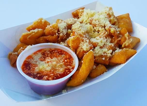 Garlic Parm Nugs · Our famous dough, fried and topped with garlic butter and parmesan cheese. Served w/marinara
