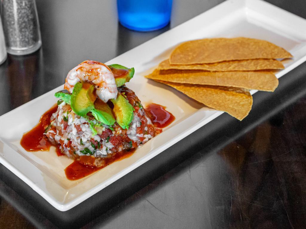 Ceviche Tower · Boiled shrimp diced with pico de Gallo mix and fresh lime juice.  2 tostadas and ceviche sauce. 