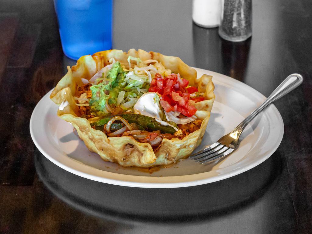 Fajita Taco Salad · Grilled chicken, steak or mixed, topped with beans, cheese, lettuce, tomatoes, onions, bell peppers, guacamole and sour cream.