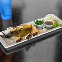 Tacos Mexicanos  · 3 pieces traditional style street tacos. Choice of meat. Onions, cilantro, salsa verde, jala...