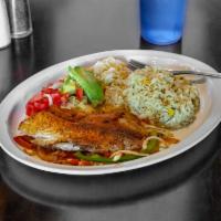 Tilapia a la Mexicano · Tilapia fillet topped with grilled onions, tomatoes, and bell pepper. Garnished with lettuce...