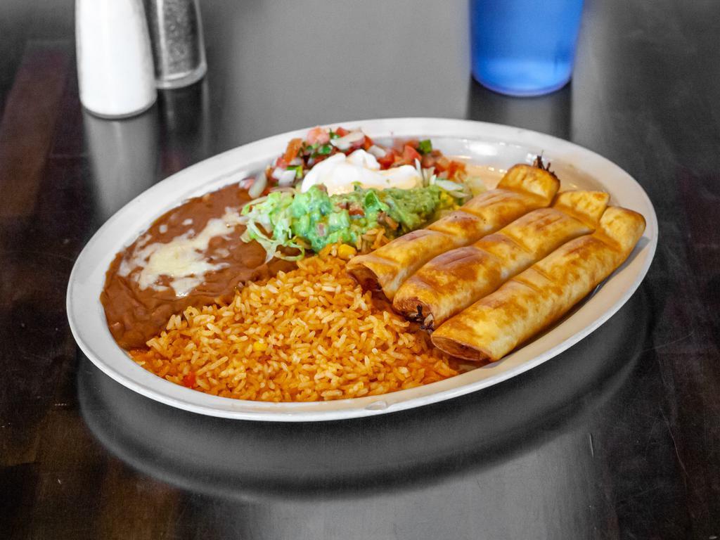 Flautas Mexicanas · 3 rolled flour tortillas with shredded  beef or shredded chicken, served lettuce, sour cream and guacamole, pico de gallo, rice and beans.
