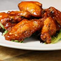 HYH Wings · Marinated, baked, fried, then tossed and sauced. Available in 4 different sizes with optiona...