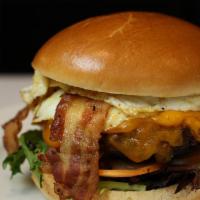 Breakfast Burger · Applewood bacon, a fried egg topped with American cheese ＆ your choice of protein served on ...
