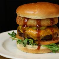 Smokey BBQ Burger · Pickels, cheddar, onion rings, generously drizzled in BBQ sauce, ＆ your choice of burger ser...