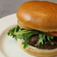 Build Your Burger · Half a pound of Angus beef char-grilled served on a bun with lettuce and tomato.