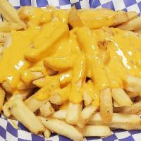 Cheese Fries · Golden crisp french fries topped with liquid cheese.