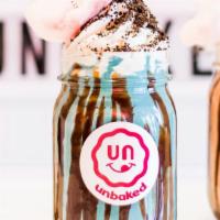 Chip Monster cookie dough milkshake · Our Chocolate Chip cookie dough and our Cookie Monster ice cream blended together, with choc...