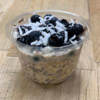 Blueberry Coconut Over Oats · oats, unsweetened almond milk, blueberries, coconut, cinnamon, maple syrup , chia seeds
