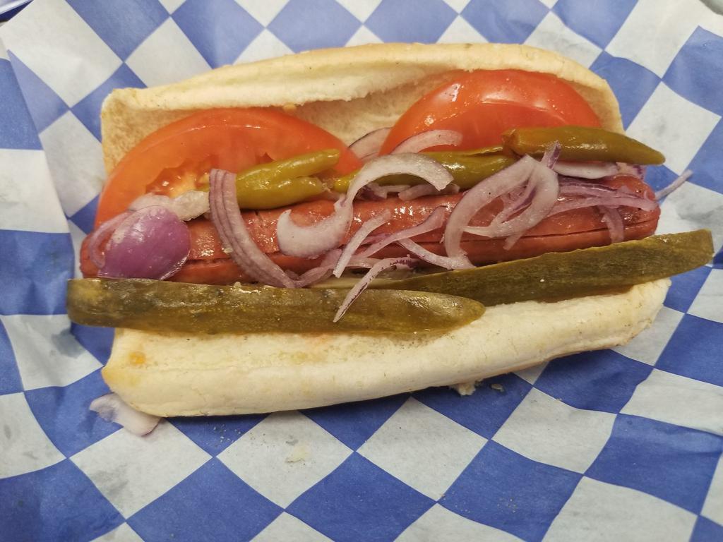 Chicago Dog · Served with pickle spear, tomato, onion, sports pepper and celery salt.