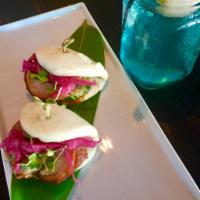 Bao Chashu Pork Belly · Chashu pork belly, stuffed in to steam bun, pickled purple cabbage, cilantro, spring mixed a...