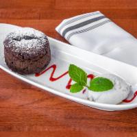 Red Beach · Chocolate lava cake, red velvet cream, coconut sorbet, coulis.