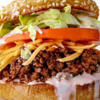 Taco on a Bun · No taco shell, All else is on a sesame seed bun. Freshly cooked ground beef, cut tomatoes, s...