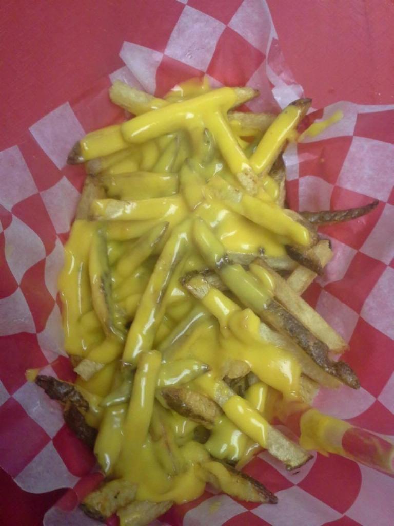Cheese Fries · Fresh Cut Fries Covered In Cheddar Cheese Sauce