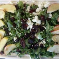 Kale Salad · Kale with organic quinoa, feta, sliced apple and dried cranberries topped with white balsami...