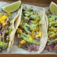 Ahi Tuna Tacos · Seared with Mango Pico and Tomatillo sauce on corn tortillas 