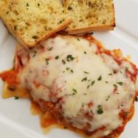 Lasagna della Casa · Layered pasta with meat and Italian cheese, baked in red sauce, topped with whole milk mozza...