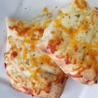 Stuffed Cheesy Bread with Bacon and Jalapeno · Baked bread that has been flavored with cheese. 