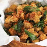 Spicy Basil Fried Popcorn Chicken · Fried chicken breast bites tossed in spicy basil sauce (with fresh basil)