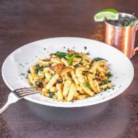 Cavatelli Aldo Moro · Homemade cavatelli sauteed with broccoli rabe, crumbled spicy Italian sausage, and finished ...