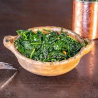 Sauteed Spinach · Spinach sauteed in a roasted garlic and olive oil sauce.