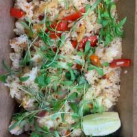 Thai Fried Rice · Jasmine rice, bell peppers, red onions, Thai basil, tomatoes, and cilantro.