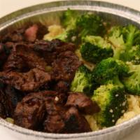 Grilled Marinated Steak Tips · Served with broccolli and rice pilaf or fries.