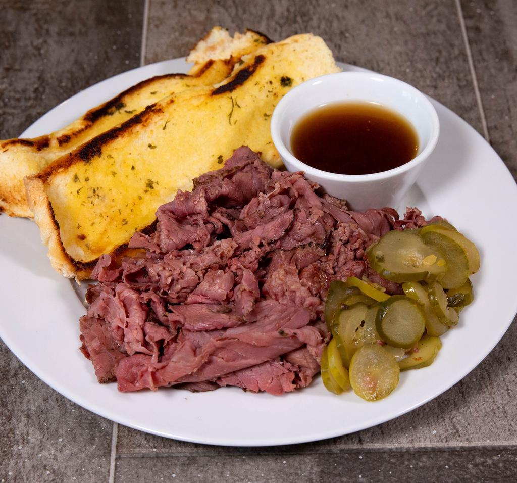 Pastrami Stack Hot Sandwich · 1/2 lb. pastrami on a French roll with pickle, spicy mustard and au jus.