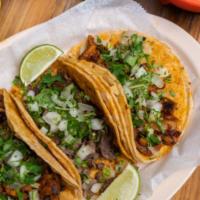 Tacos · Corn or flour tortilla filled with meat of your choice, onion and cilantro or lettuce and to...