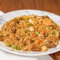 House Special Fried Rice · Chicken, beef, shrimp, egg, onion, pea, and carrot.