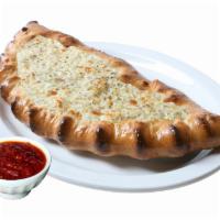 Individual White Calzone · With white sauce (olive oil, garlic and basil), mozzarella and ricotta cheese.