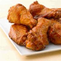 Buffalo Wings · Bone-in wings are oven baked and tossed in tangy Buffalo sauce.