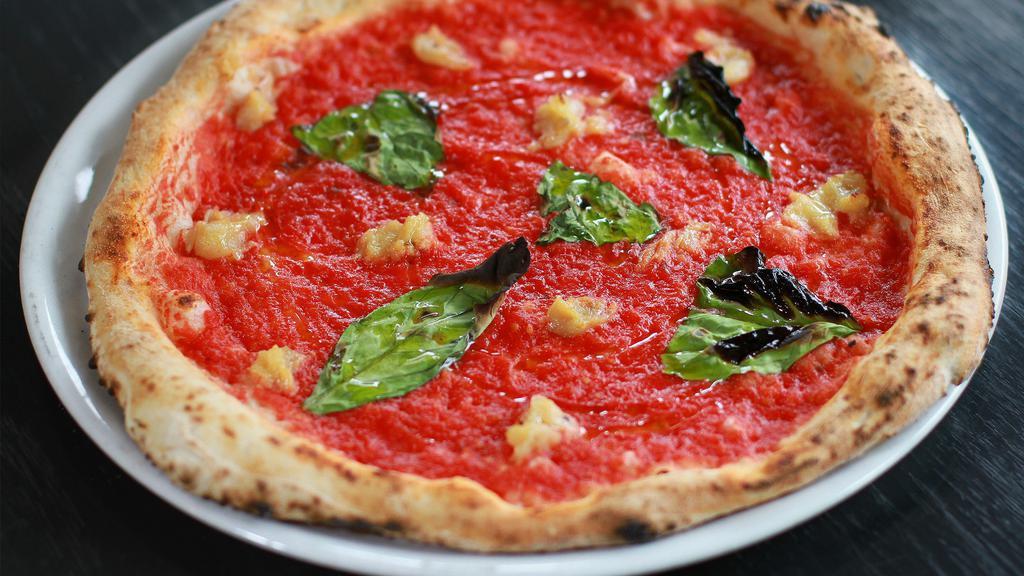 Marinara Pizza · Pomodoro (tomato sauce), roasted garlic, basil and extra-virgin olive oil. Vegan.
