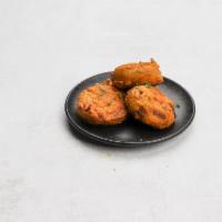 4. Paneer Pakoras · Fresh homemade cheese, deep fried in spicy check pea batter.