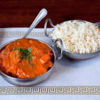 11. Chicken Tikka Masala · Diced chicken tandoori cooked in a mild sauce with mild herbs and spices. Served with basmat...