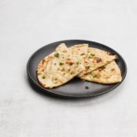 1. Nan · White bread baked in our tandoor.