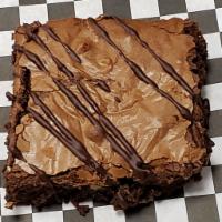 Brownie · Fudgy, chocolaty, and nutty!  Three types of chocolate, chopped walnuts and thin stripes of ...