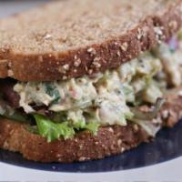 Tuna Salad Sandwich · Freshly made Tuna salad ,served with lettuce and tomatoes on your choice of bread.