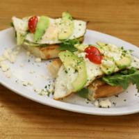 Fabio's Favorite · Fried egg, toasted baguette, spinach, avocado, feta cheese, cherries, tomatoes and pesto.